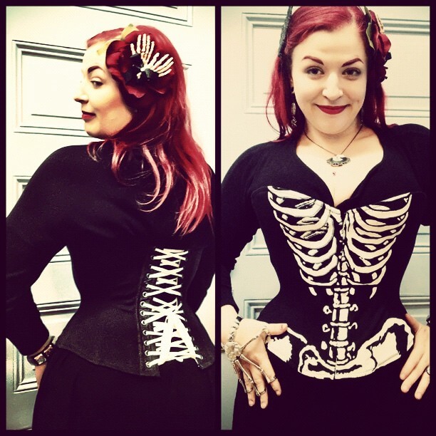 A t-shirt corset referencing the above illustration.  Model: Chrysalis Rose, Corset: Pop Antique.